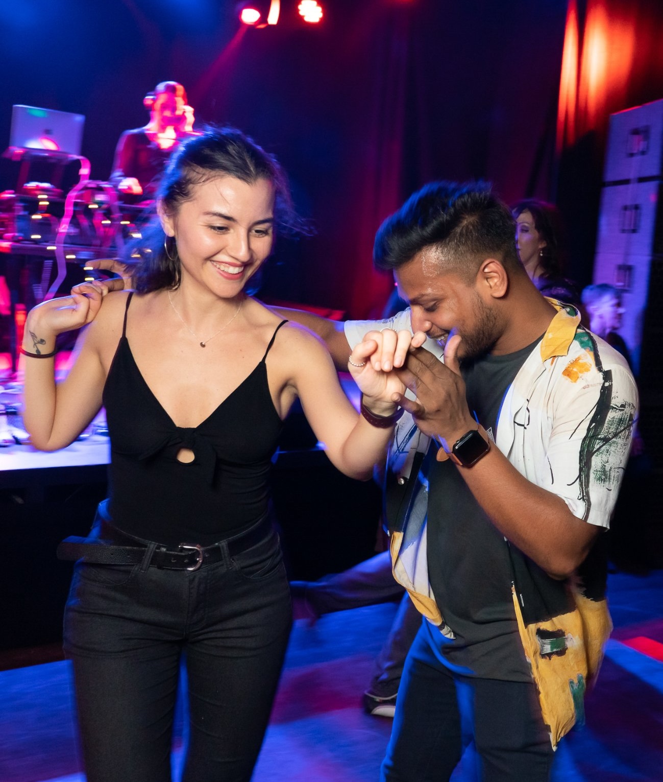 Two Salsa dancers enjoying the music together